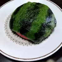 西瓜食ふ回覧板に歪む印